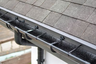 Inspecting Gutter Covers in Late Summer